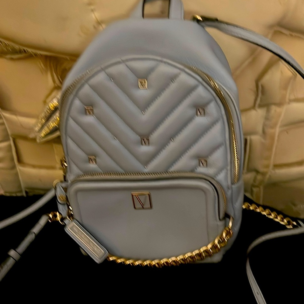Victoria Secret gray leather gold studded adjustable traps, mini purse/backpack